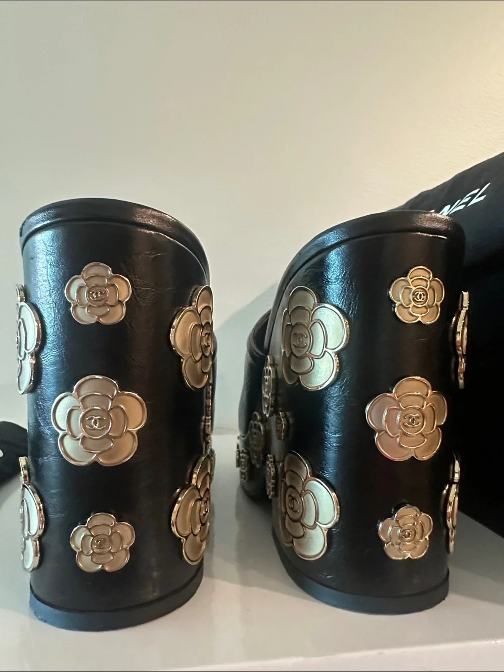 CHANEL Black Leather Camellia-Embellished Mules